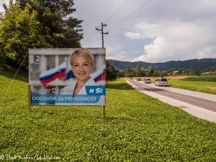Mojca Kucler Dolinar is a Slovenian politician. And she was standing along the road in Dobrava. She's currently a member of the Municipal Council of Ljubljana for her party New Slovenia.
