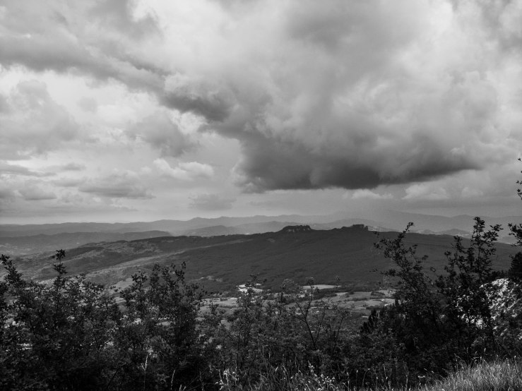 I don't know much about meteorology  but this looks like a nimbostratus cloud. It produced at least a lot of rain.