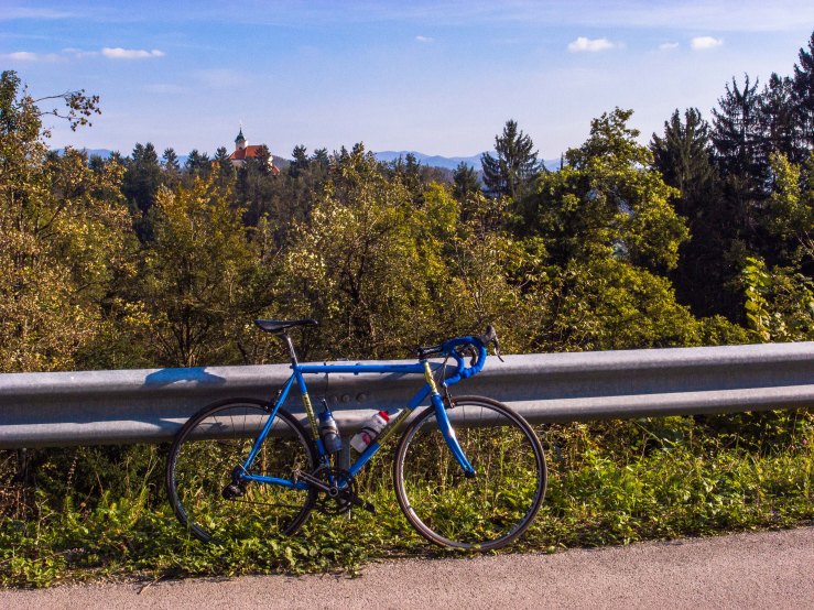 The Saint Ulrich church lies at and altitude of 428 metres 80 metres above the village of Zaklanec. The racebike is mine.
